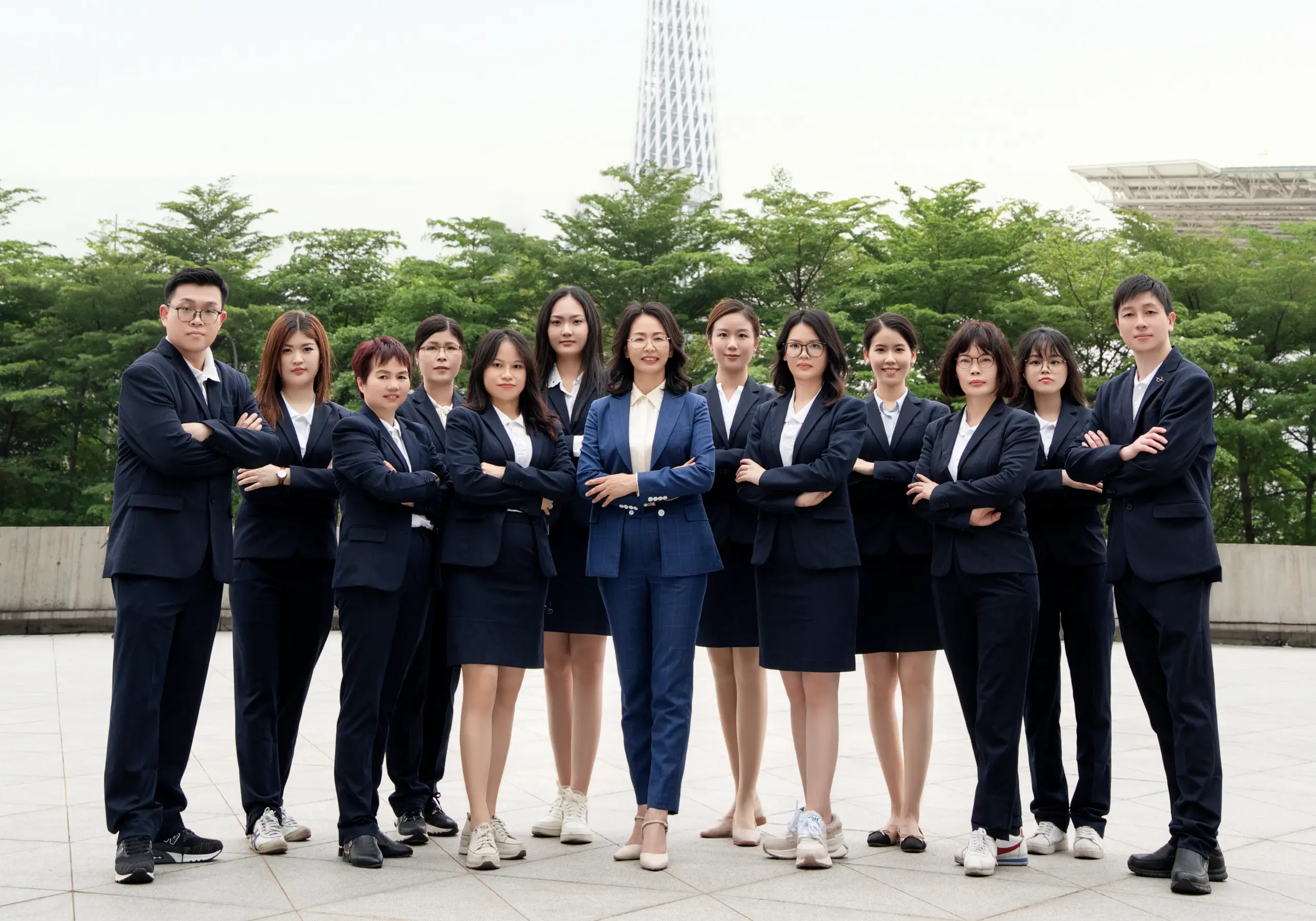 Kerui team group photo in Guangzhou with Canton Tower in the background, marking the 2017 tax and accounting company