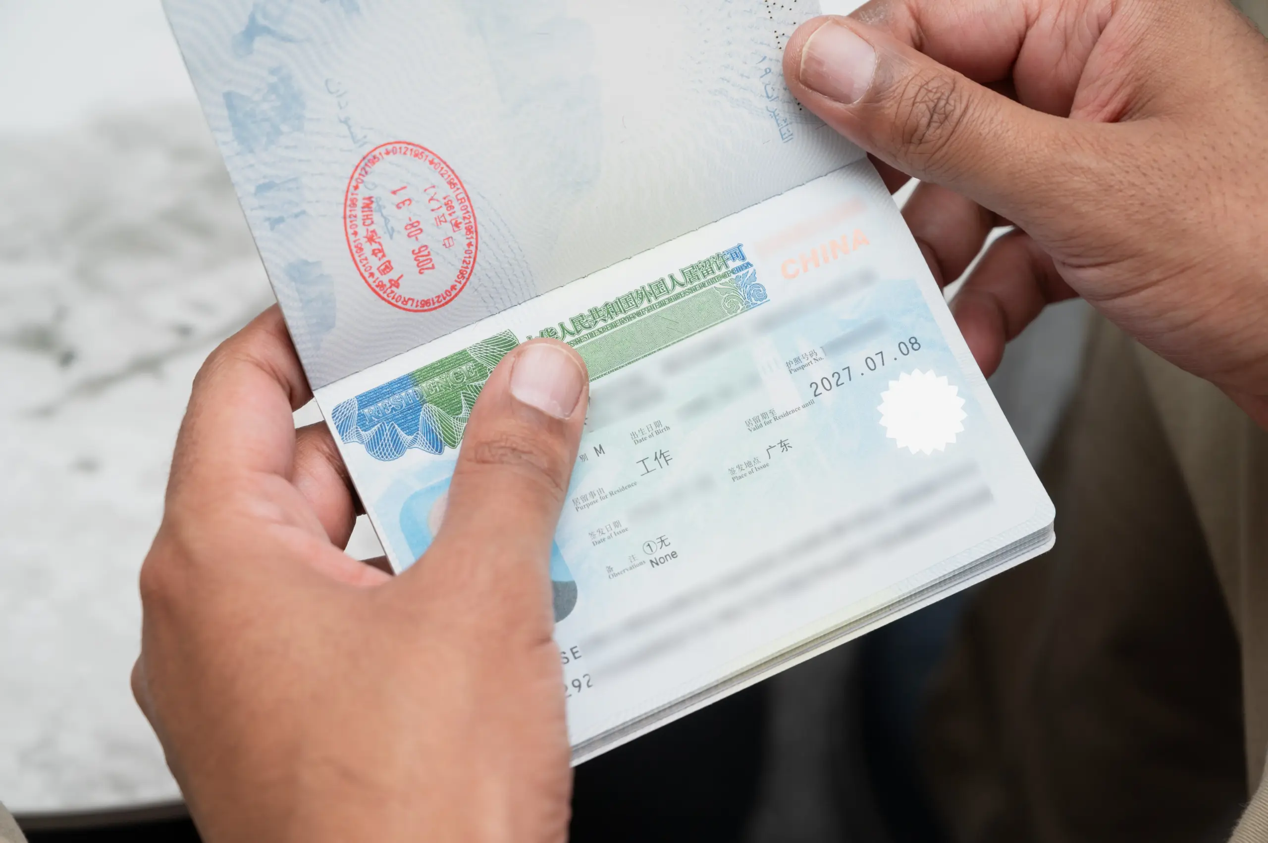 China residence permit for foreigners sample shown in a passport
